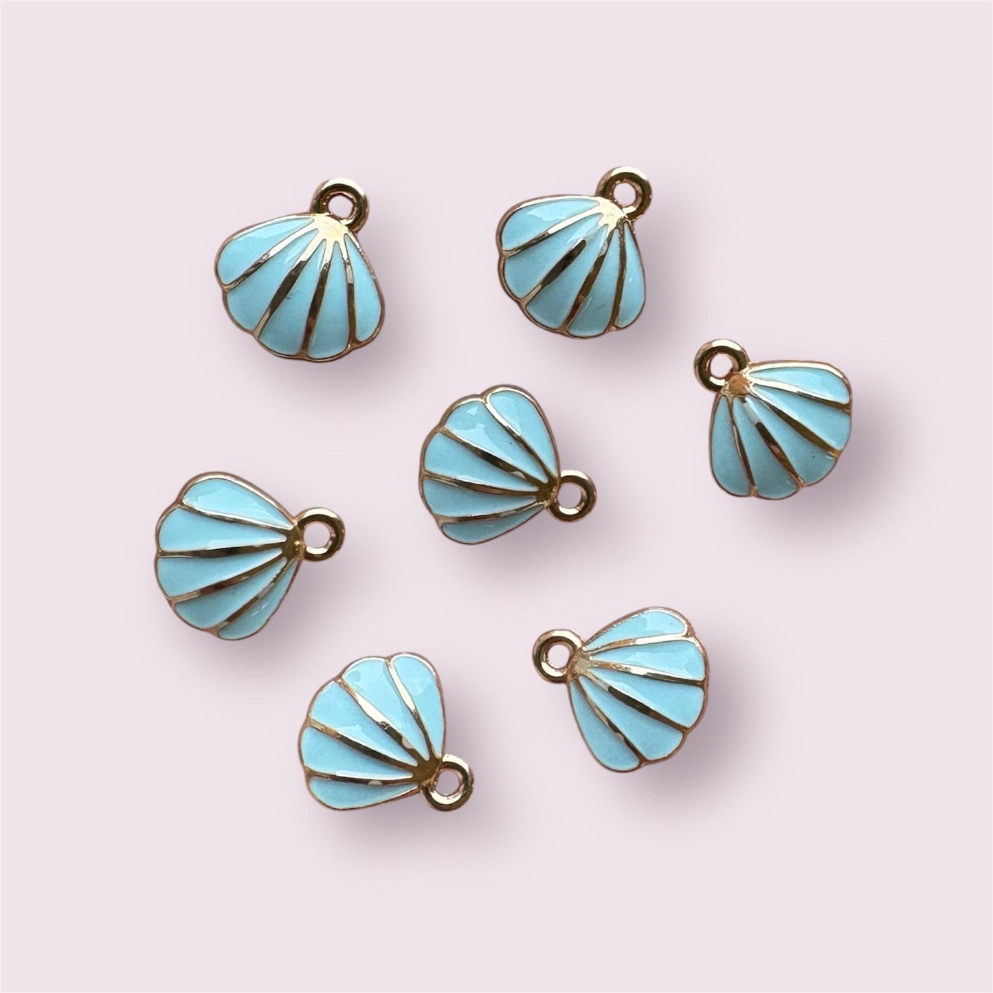 Shell charms, pale blue 11mm