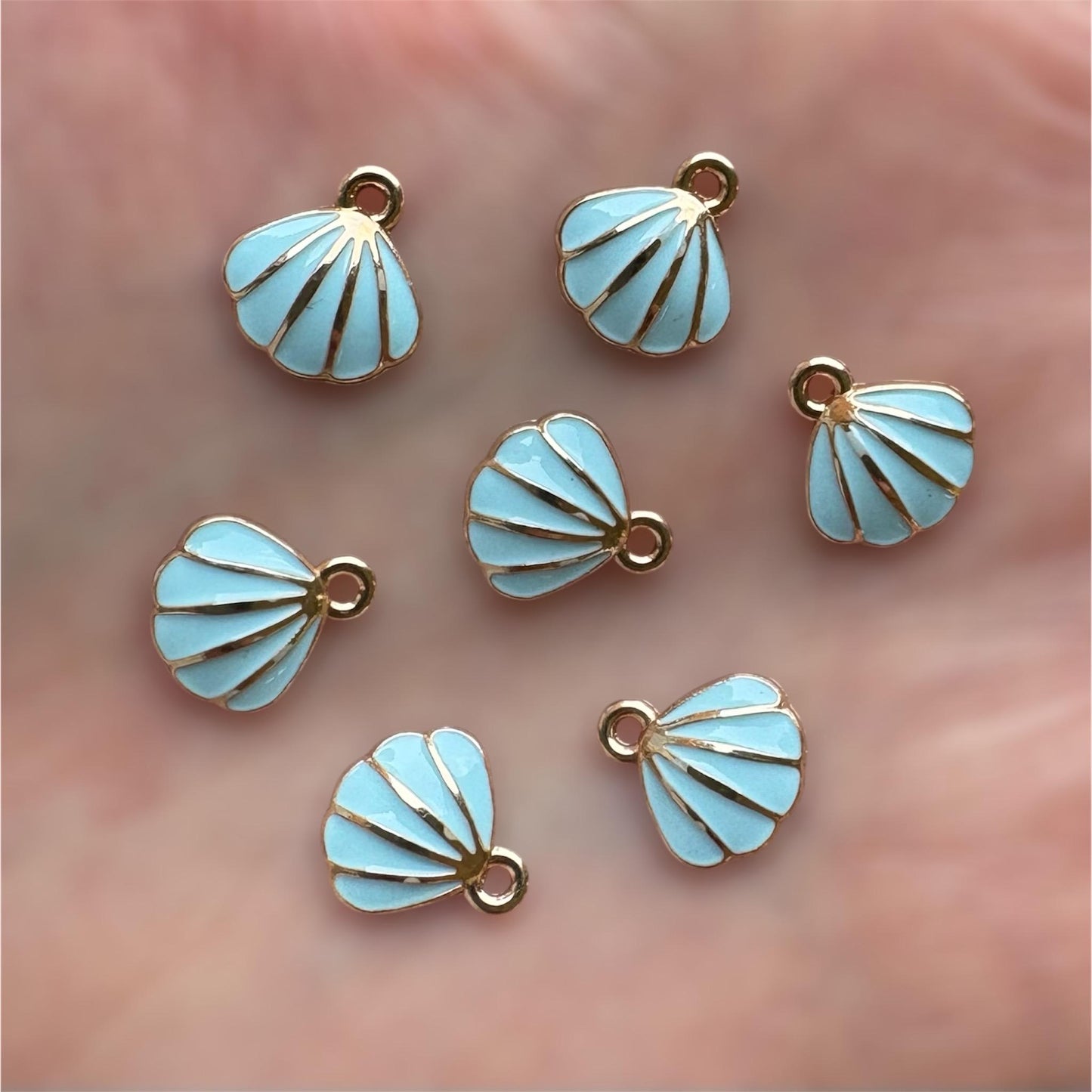 Shell charms, pale blue 11mm