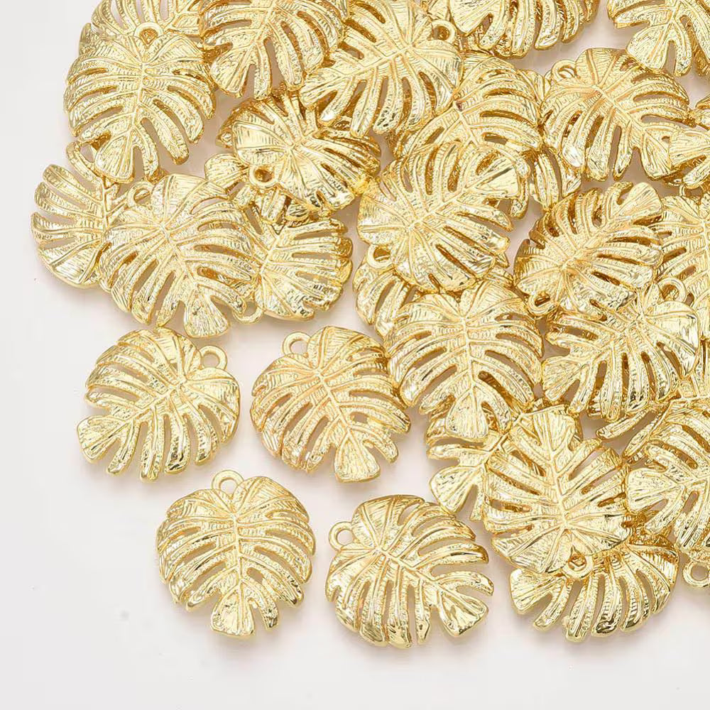 Gold leaf charms, tropical leaves, 22mm