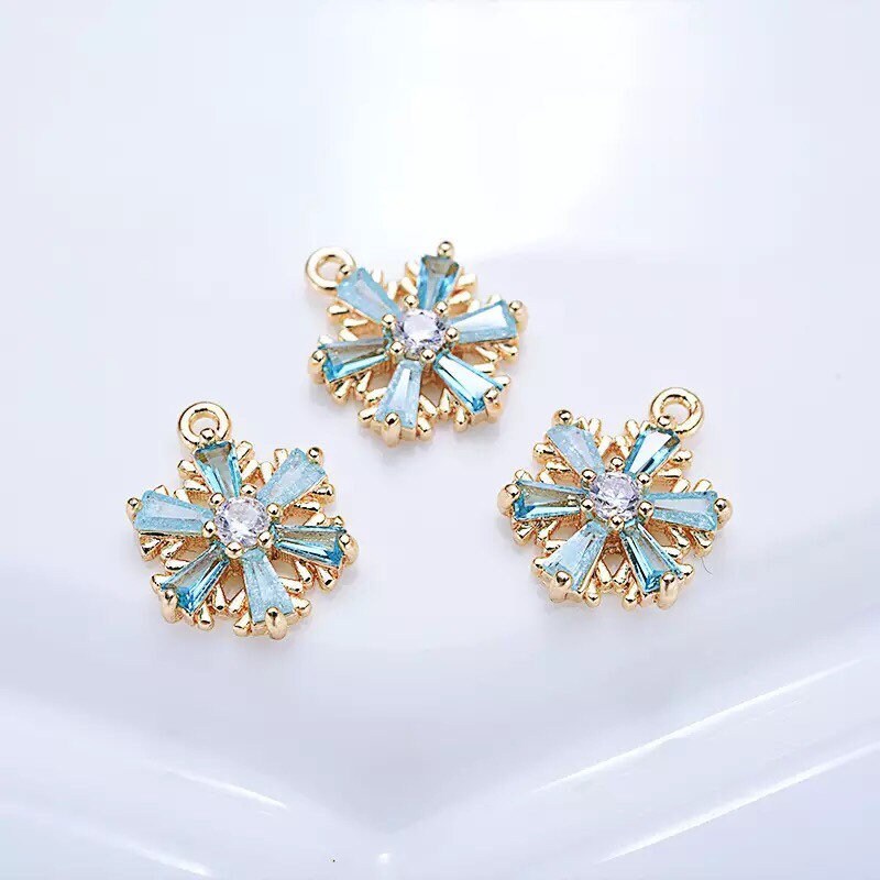 Snowflake charms 18k gold plated snowflake, blue cubic zirconia