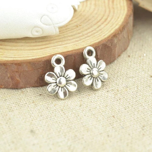 Silver antique style flower charms x 6, 12mm