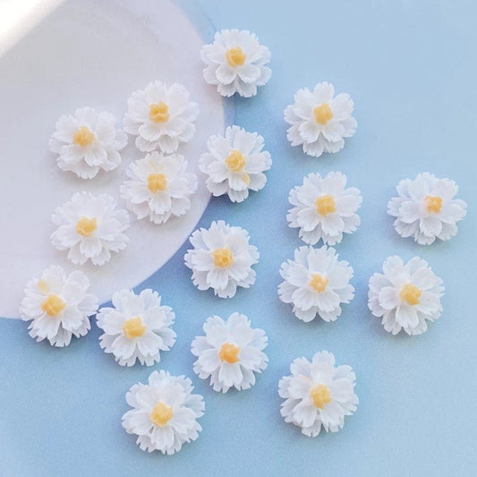 White flower cabochons, yellow centre 13mm