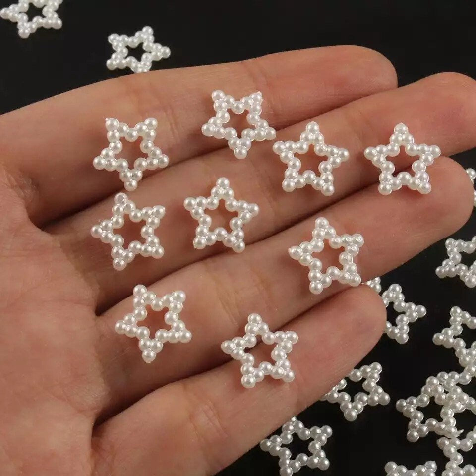 White pearlised hollow star 12mm