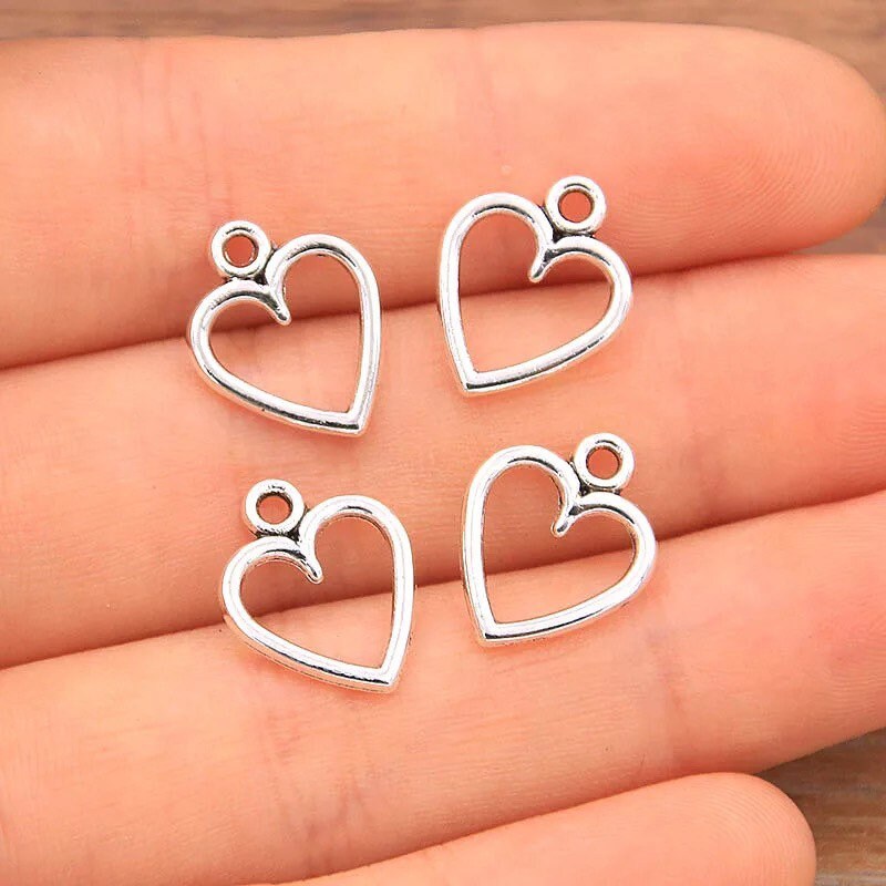 Gold heart charm, open heart