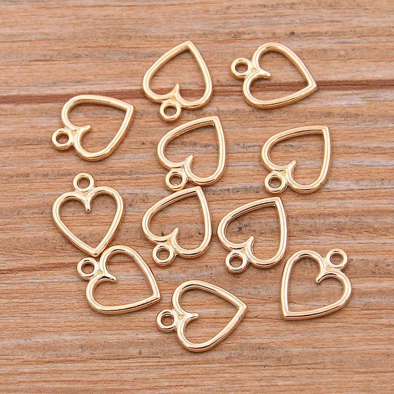 Gold heart charm, open heart