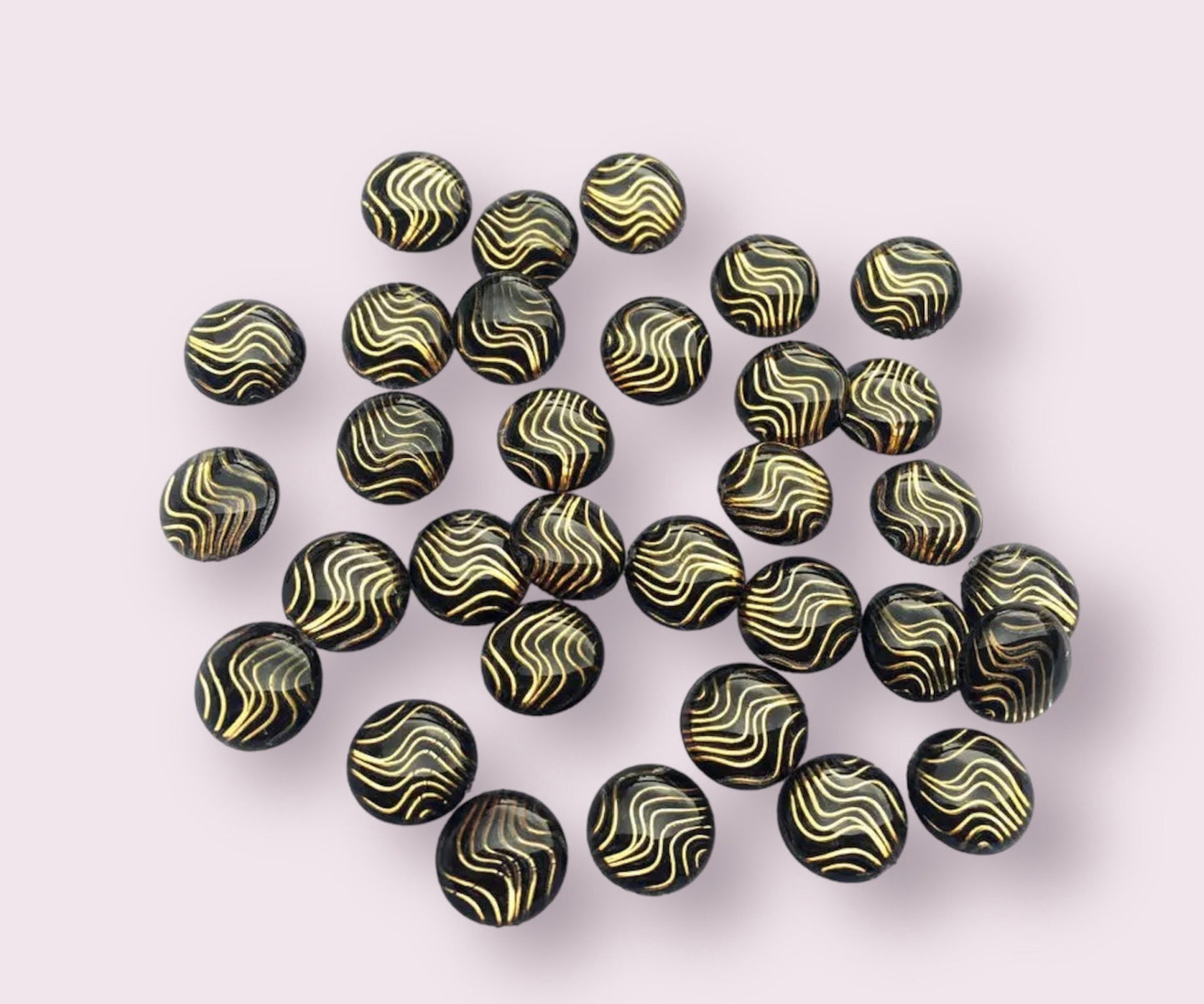 Round black wavy patterned cabochons, 10mm