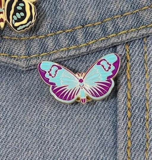 Blue butterfly pin badge