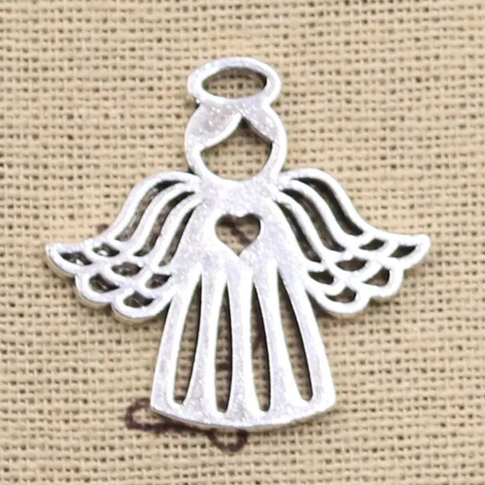 Silver angel pendant, antique silver heart