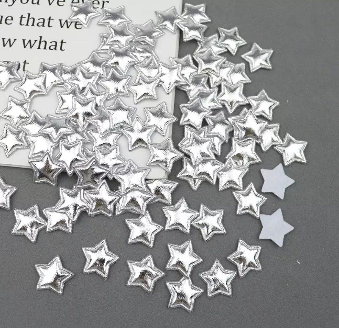 Metallic silver padded fabric stars, 2cm