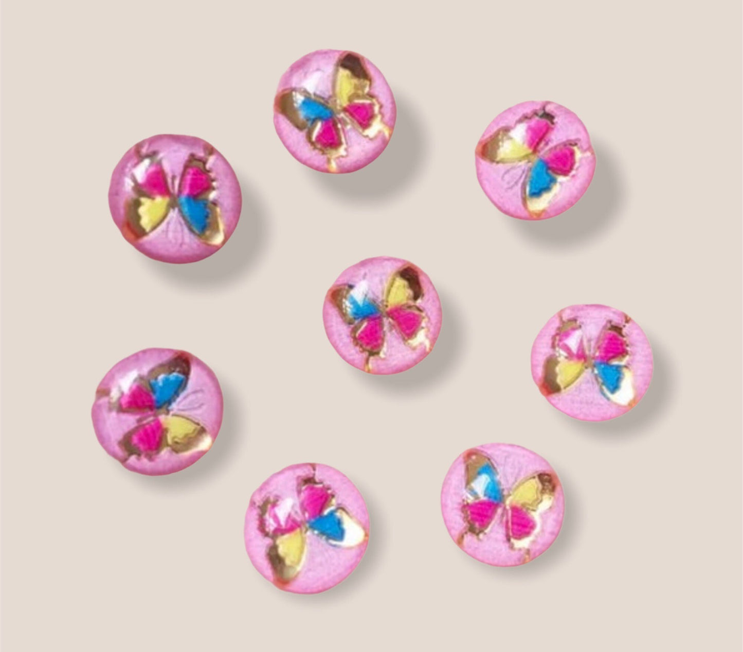 Round pink cabochon, butterfly 10mm