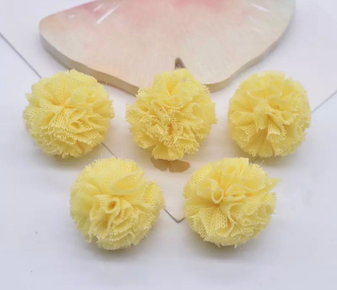 Yellow mesh fabric balls, 25mm