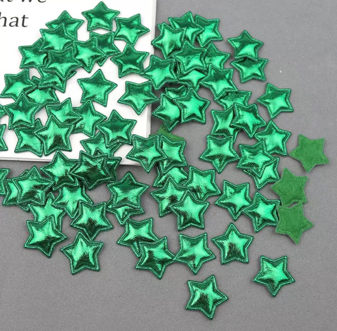 Metallic green padded fabric stars, 25mm