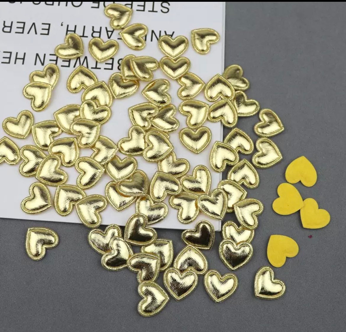 Heart shaped gold metallic fabric embellishments, 17mm