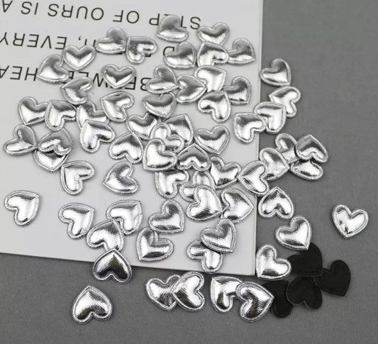 Heart shaped silver metallic fabric embellishments, 17mm