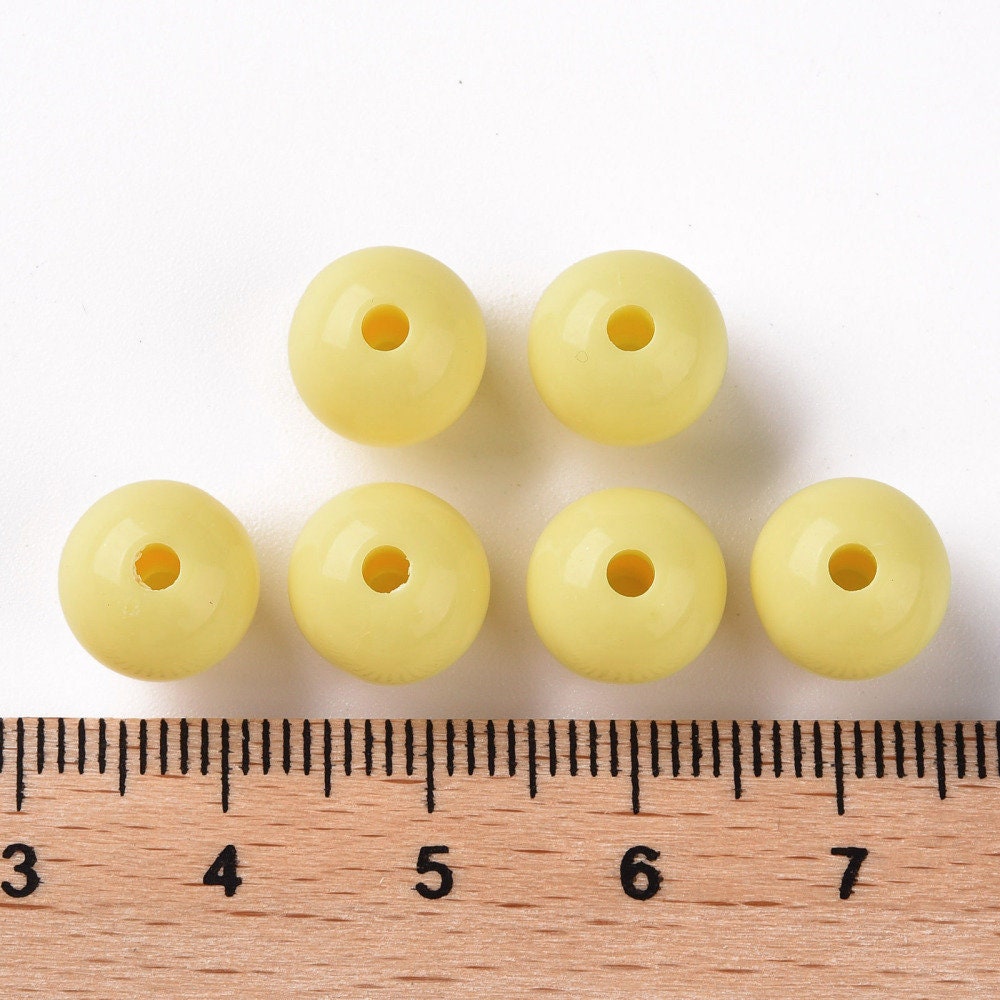 10mm yellow opaque beads, acrylic