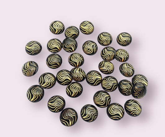 Round black wavy patterned cabochons, 10mm